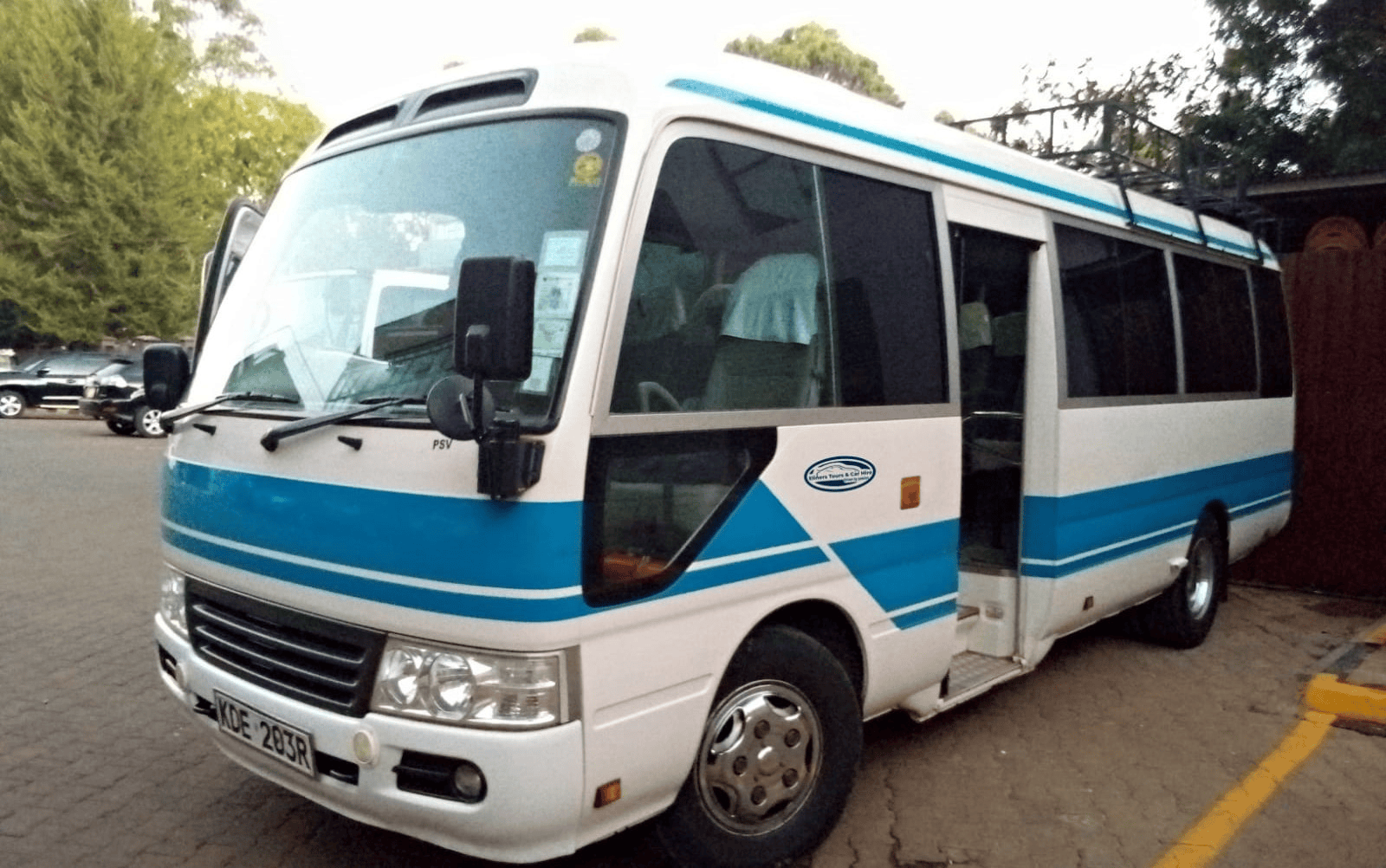 Toyota Coaster Bus for Eldoret Airport Taxi, group transfers, and tours. 22-seater ideal for corporate, school, or church travel in Eldoret and Western Kenya.