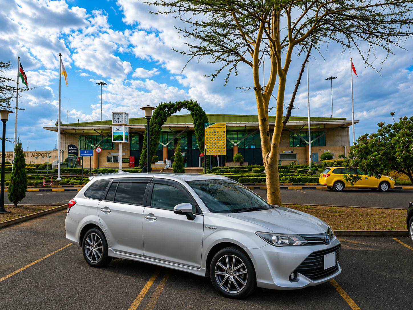 Toyota Fielder parked at Eldoret International Airport ready for car hire transfers.