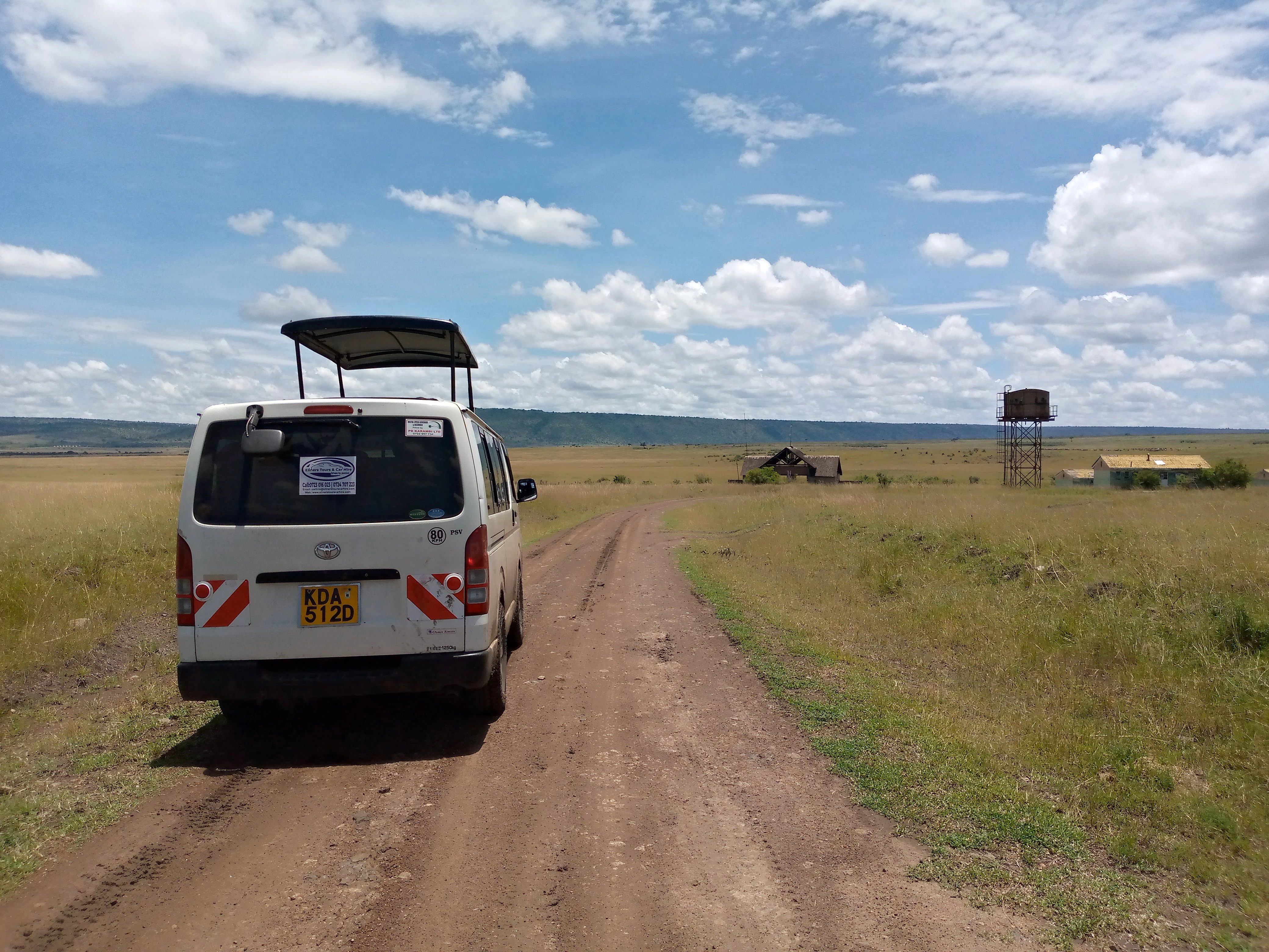 Safari van with pop-up roof for Maasai Mara game drive from Eldoret