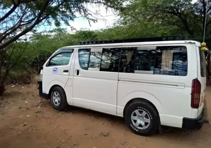 10-Seater Van side view - Rent a 10-seater van in Eldoret airport